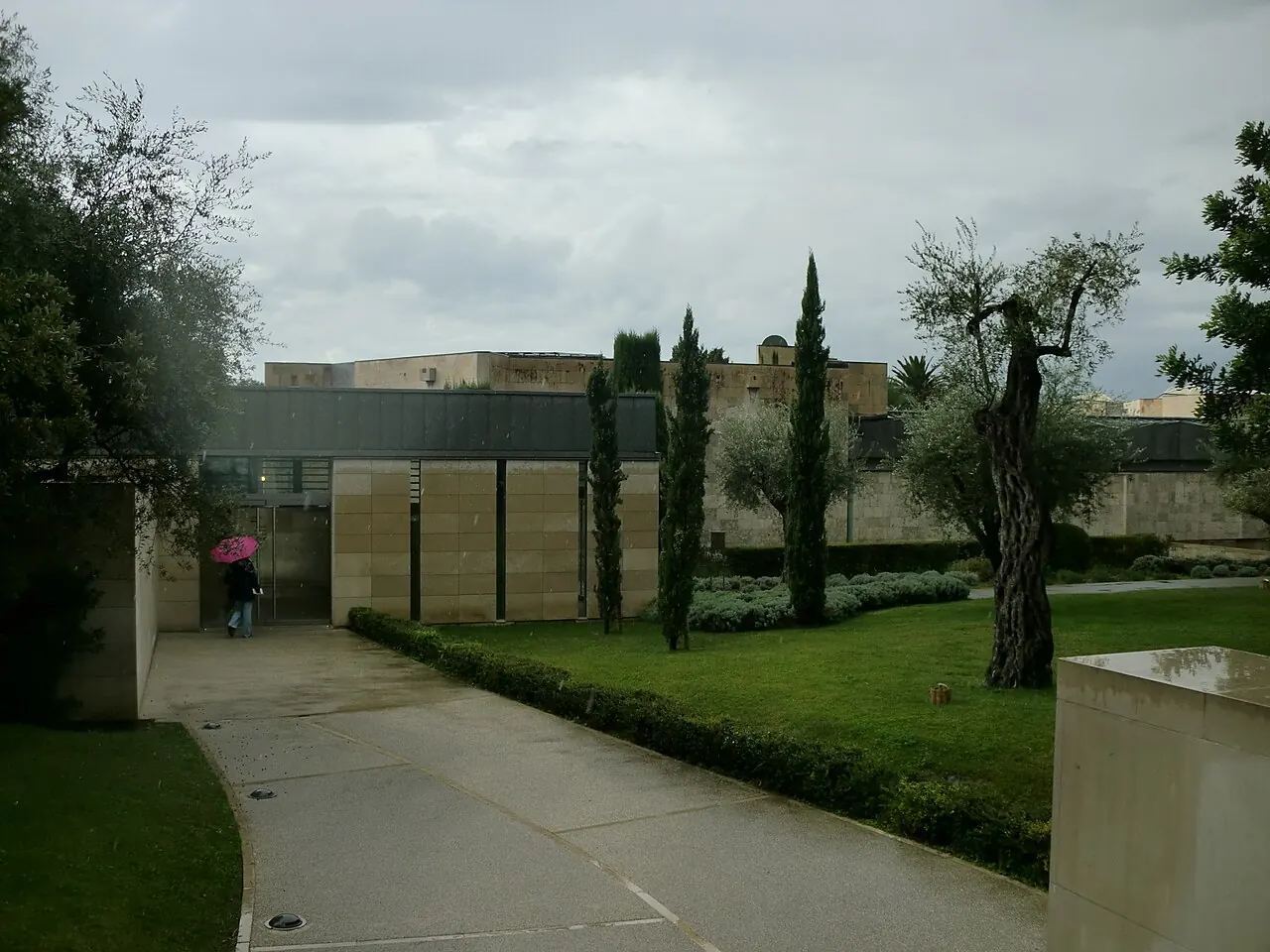 The low modern exterior of the national Marc Chagall Museum beside its garden