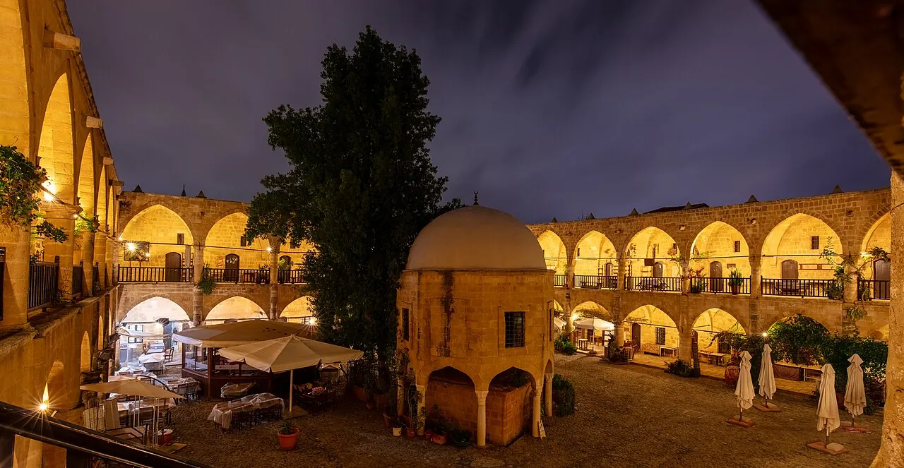 Arched galleries and the central courtyard of Buyuk Han in northern Nicosia
