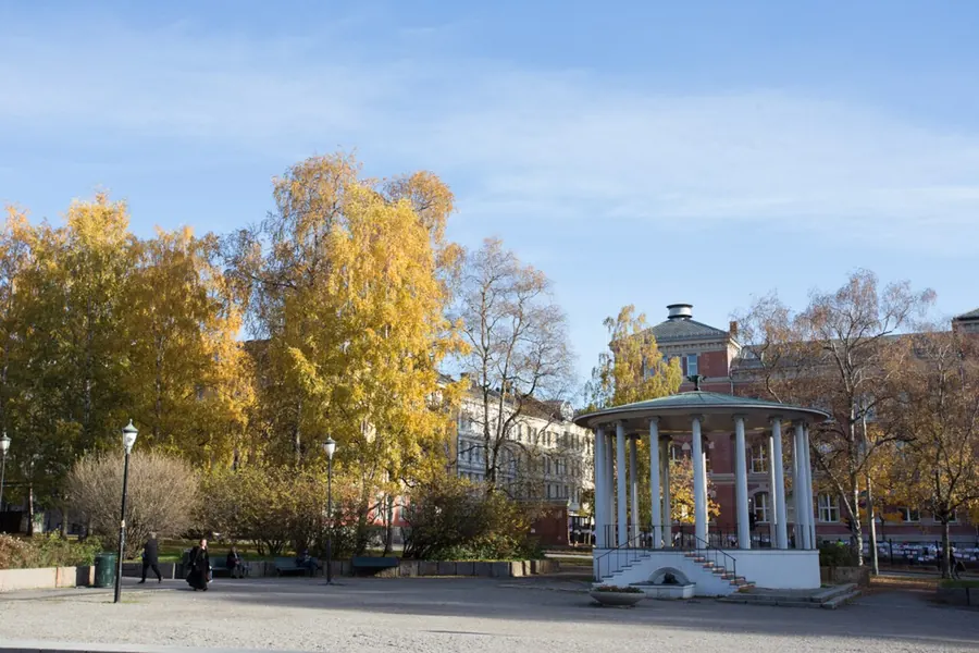 Autumn trees and the pavilion in Birkelunden park in Oslo's Grunerlokka