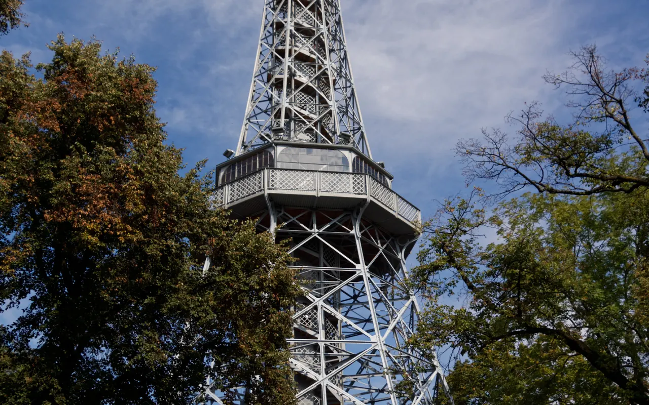 The steel observation structure of Petrin Lookout Tower surrounded by trees