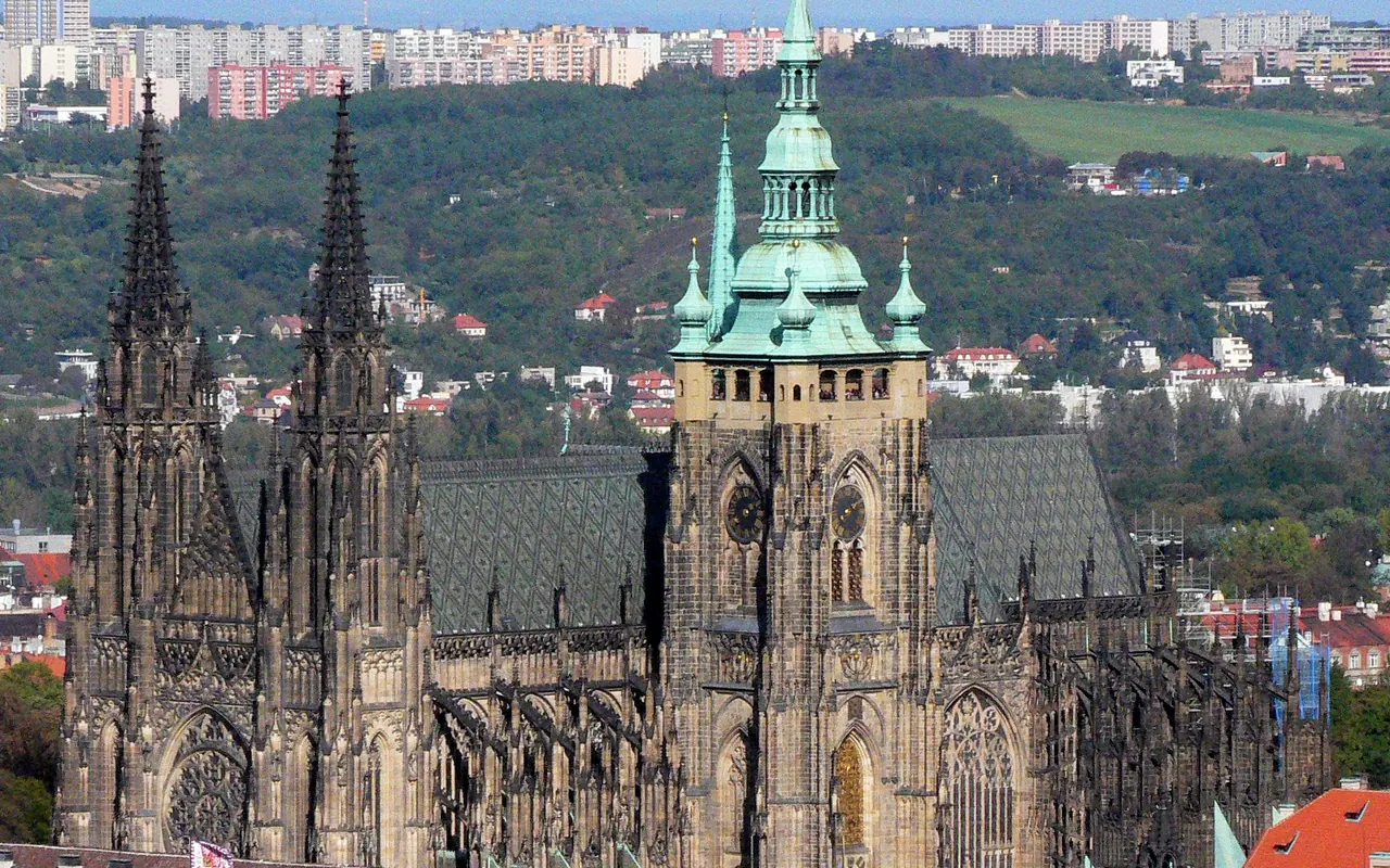 The Gothic spires and roof of St. Vitus Cathedral within Prague Castle
