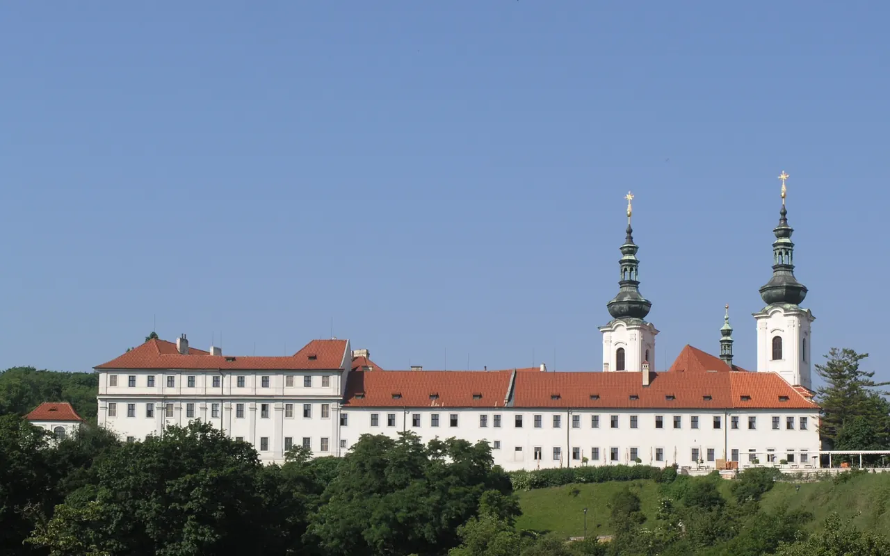 The white monastery buildings and twin church towers at Strahov