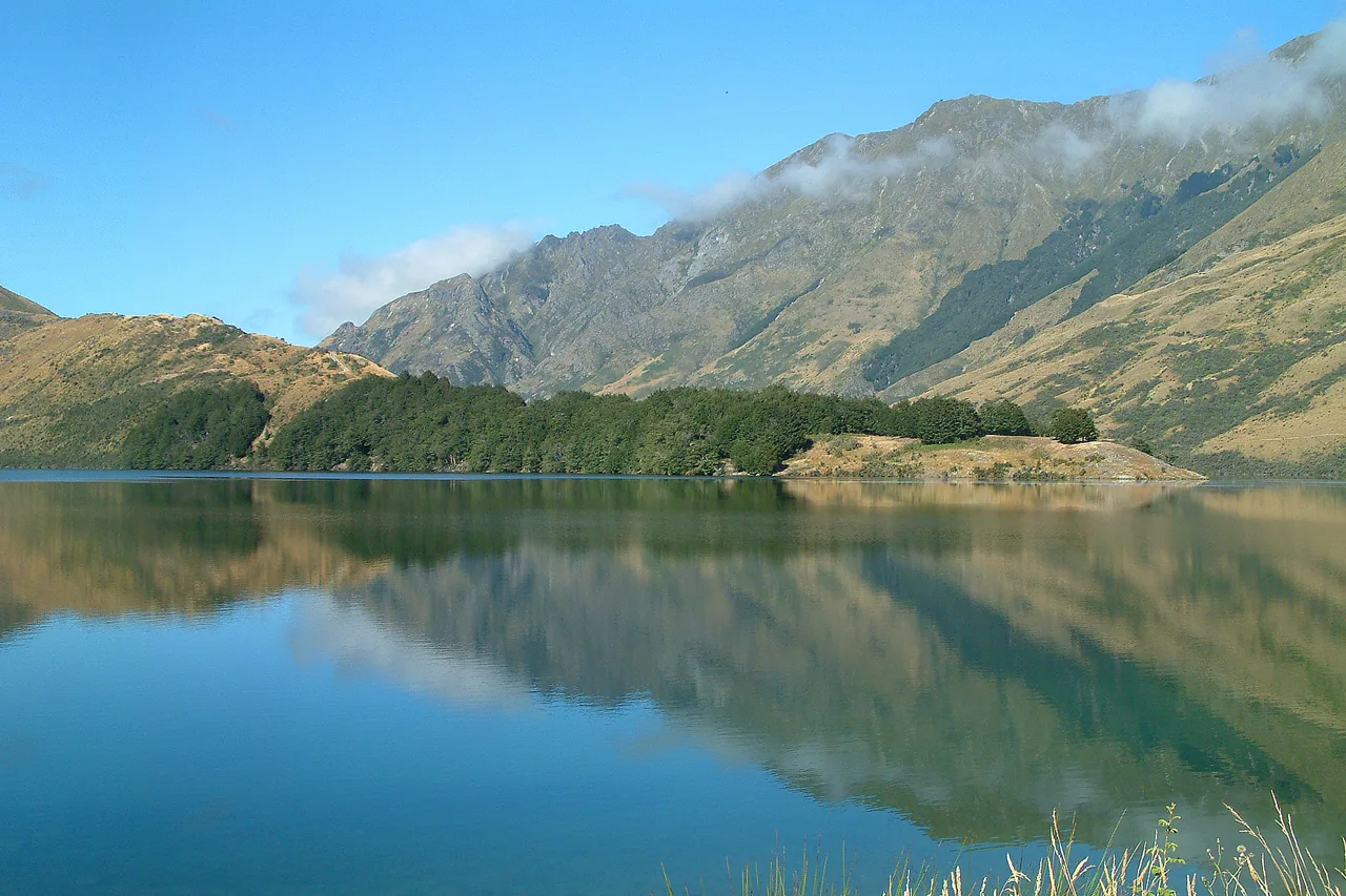 Moke Lake surrounded by open hills