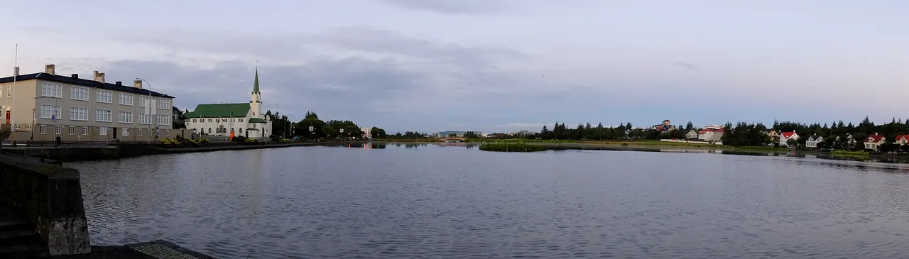 Tjornin lake and the waterfront buildings of central Reykjavik