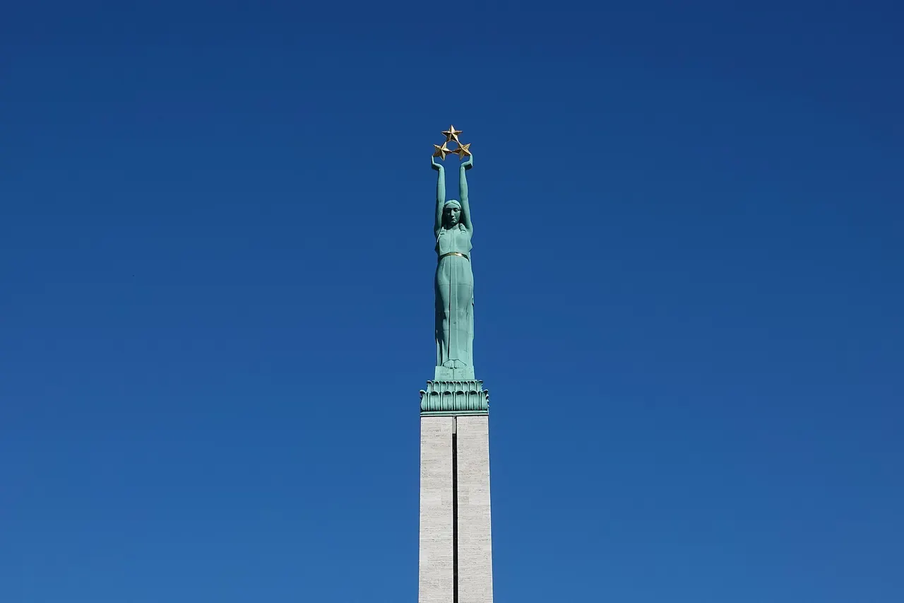 Copper three-star figure atop the stone obelisk of Riga's Freedom Monument