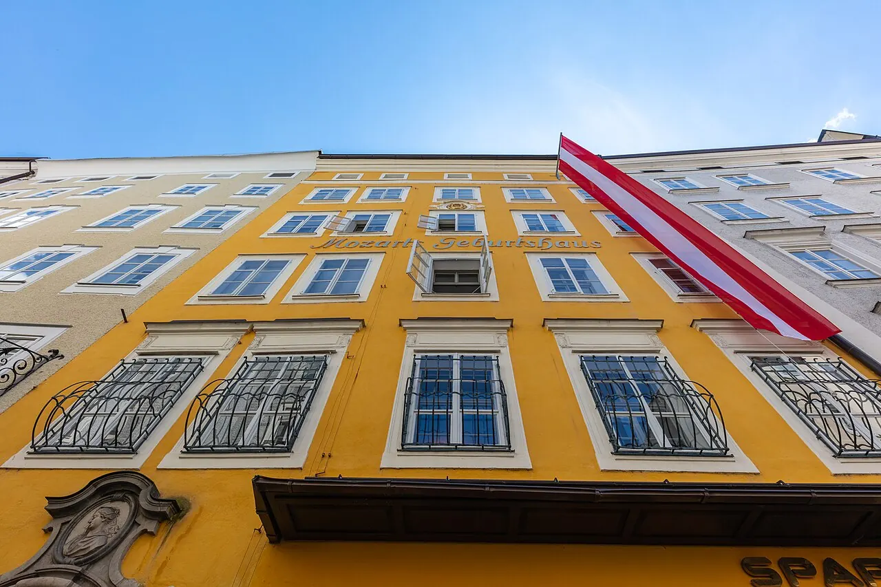 Yellow facade of Mozart’s birthplace on Getreidegasse in Salzburg
