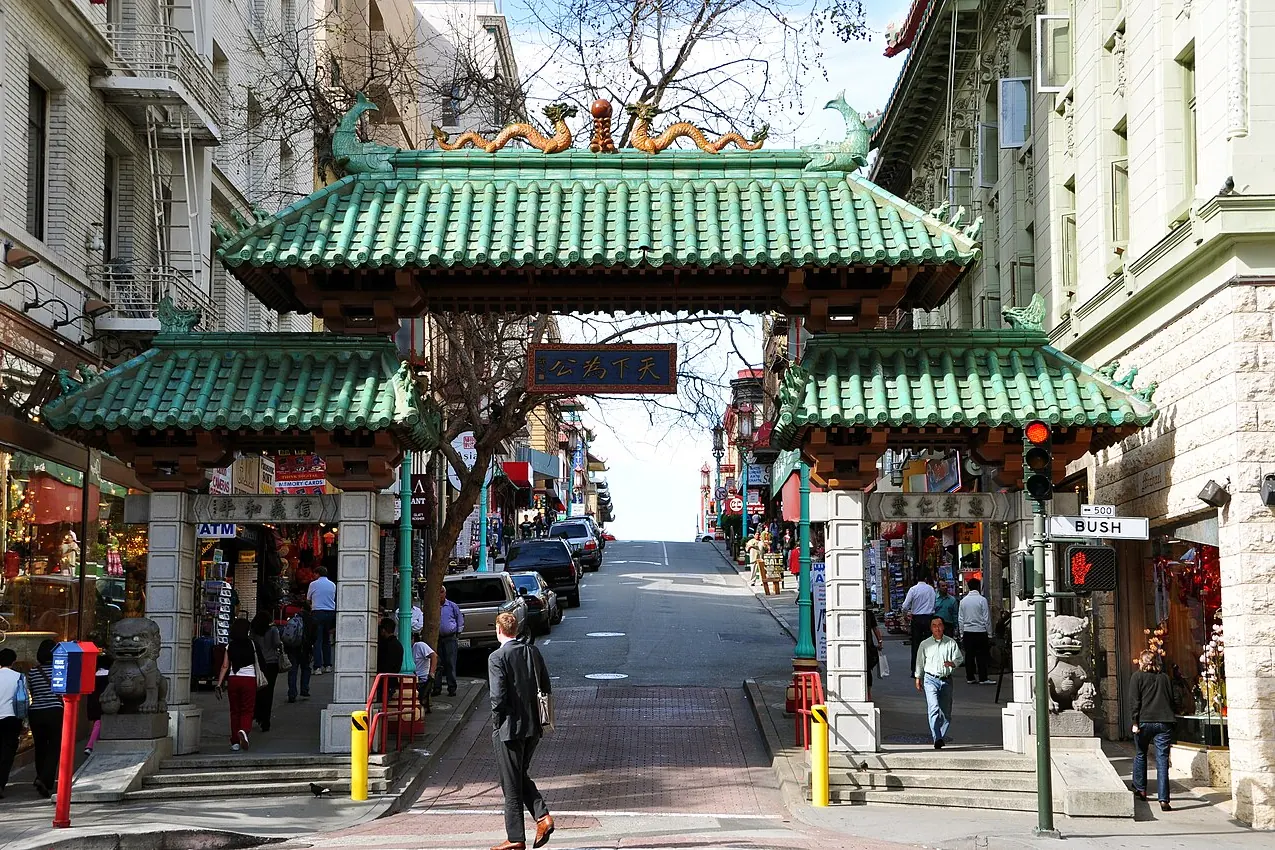 The green-roofed Chinatown gateway framing a San Francisco street
