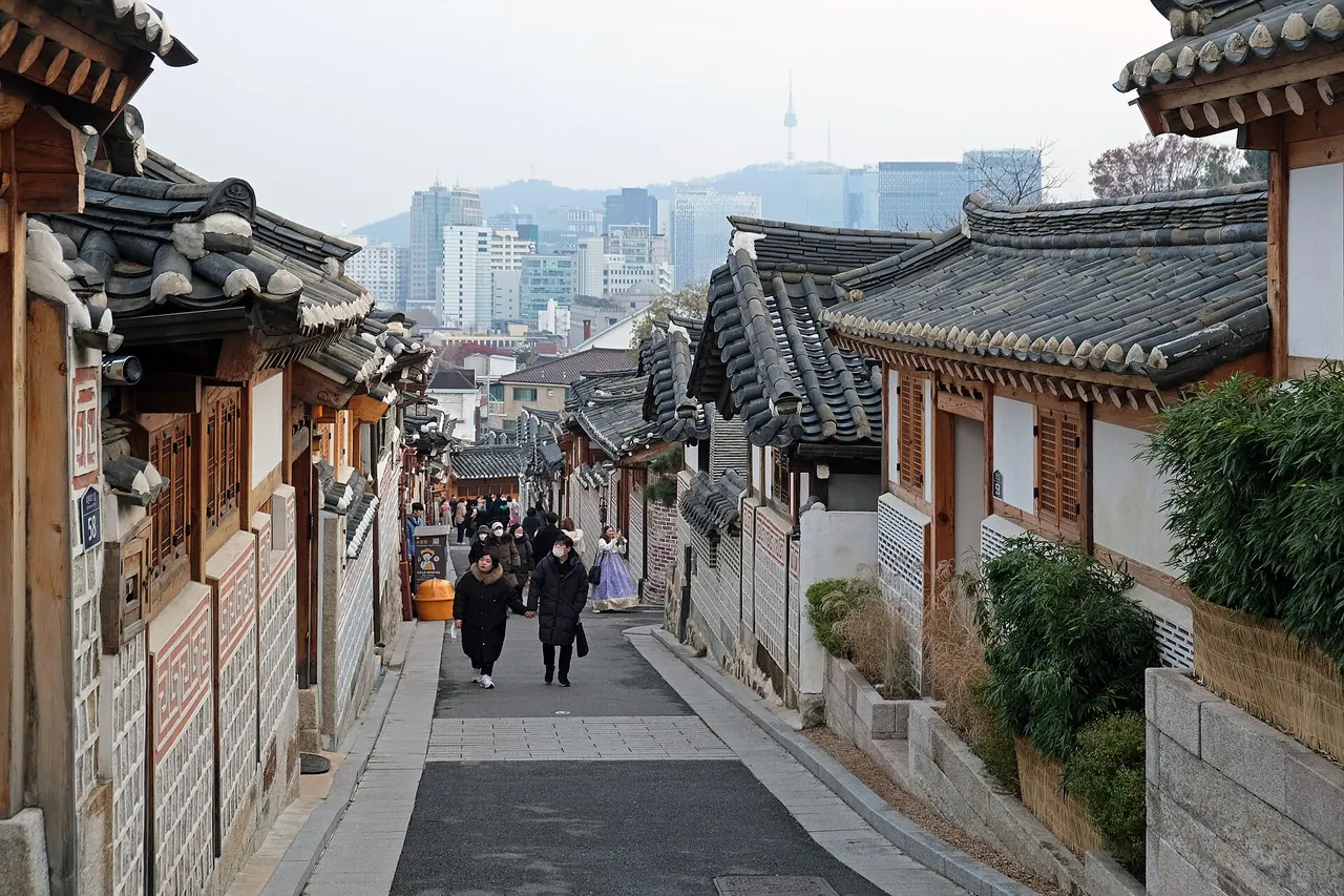 Tiled hanok roofs and a narrow residential lane in Bukchon