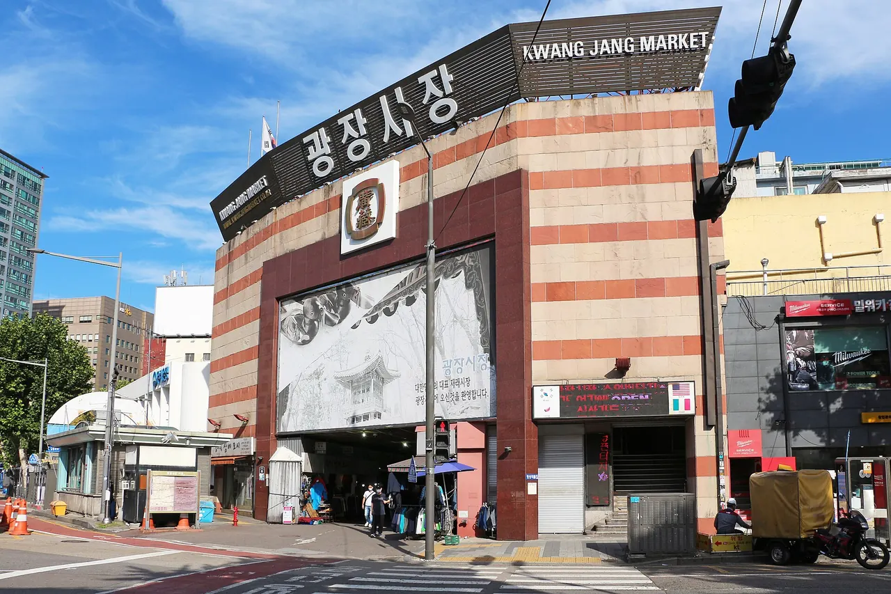 The signed street entrance to Gwangjang Market in Seoul