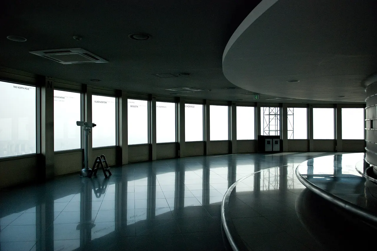 The glazed observation area inside N Seoul Tower looking out over Seoul