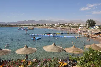 Beach and waterfront buildings around Naama Bay