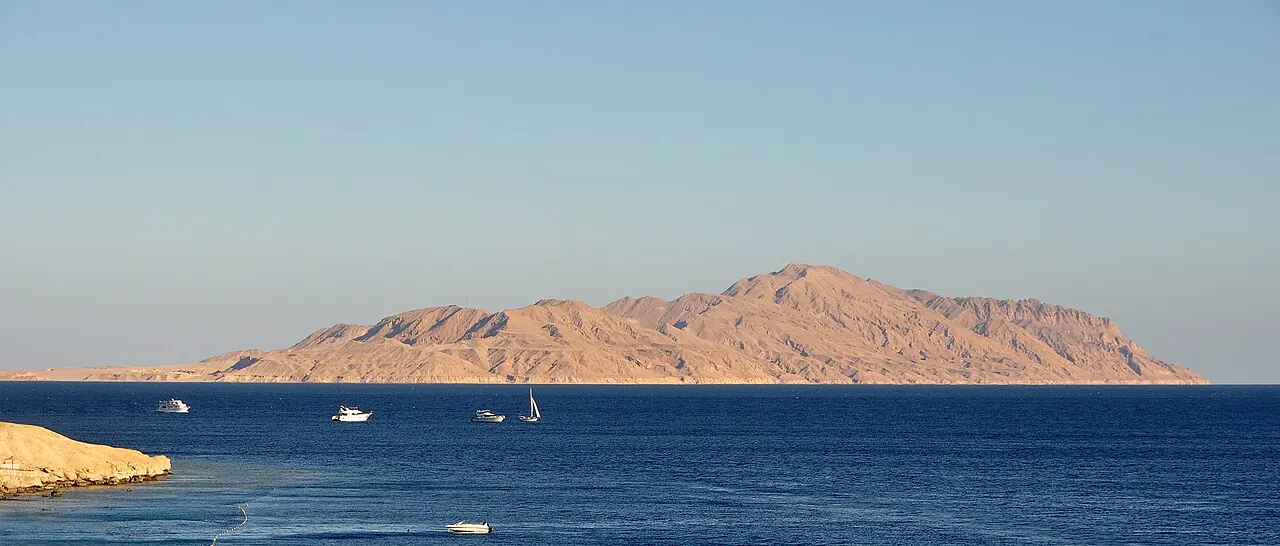 Tiran Island's desert mountains above the Red Sea