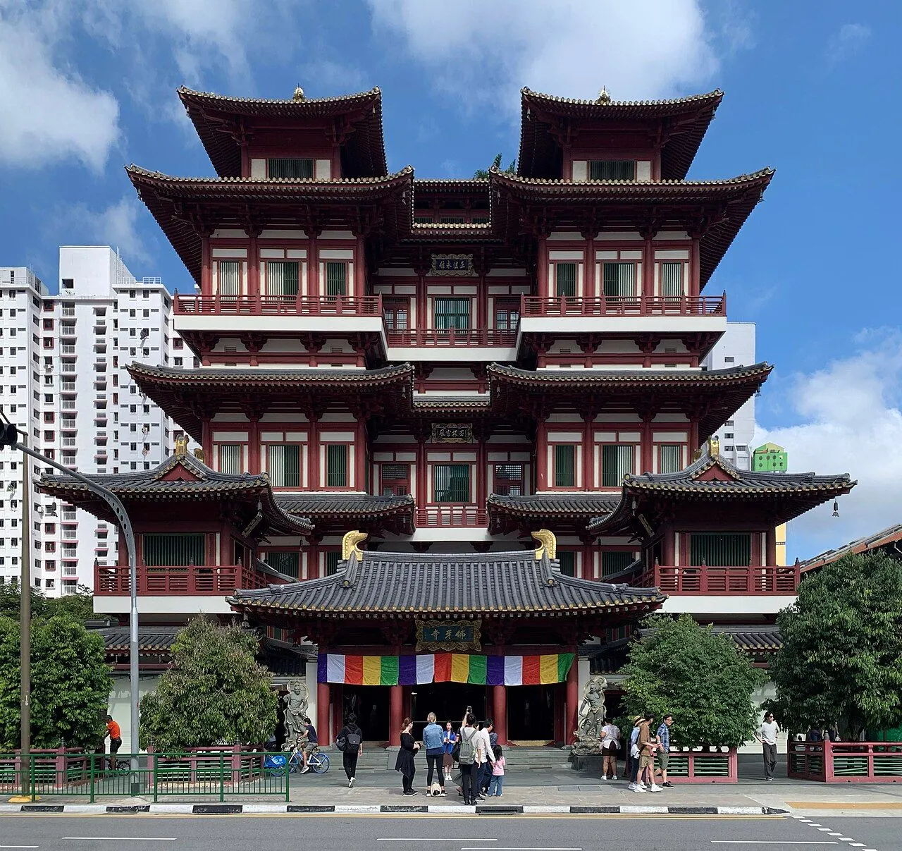 Buddha Tooth Relic Temple's red facade and layered roof in Singapore Chinatown