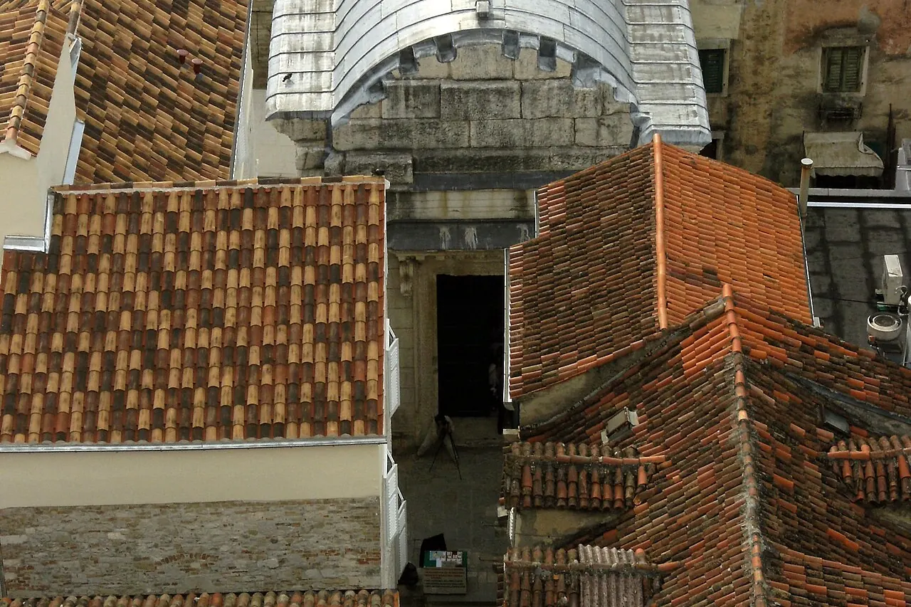 The stone facade and entrance of Jupiter's Temple in the palace quarter