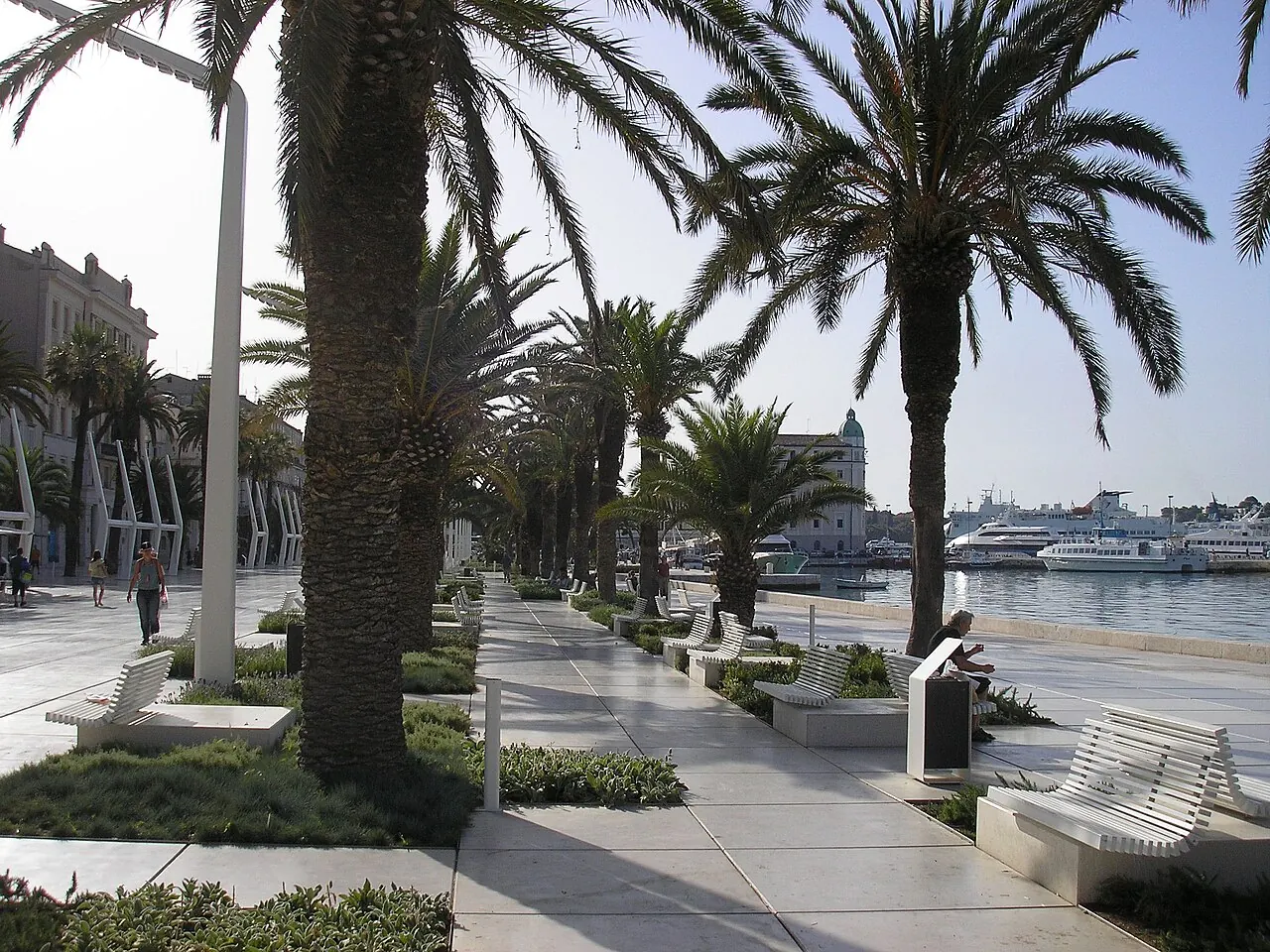 The Riva promenade along the waterfront beside the old buildings of Split