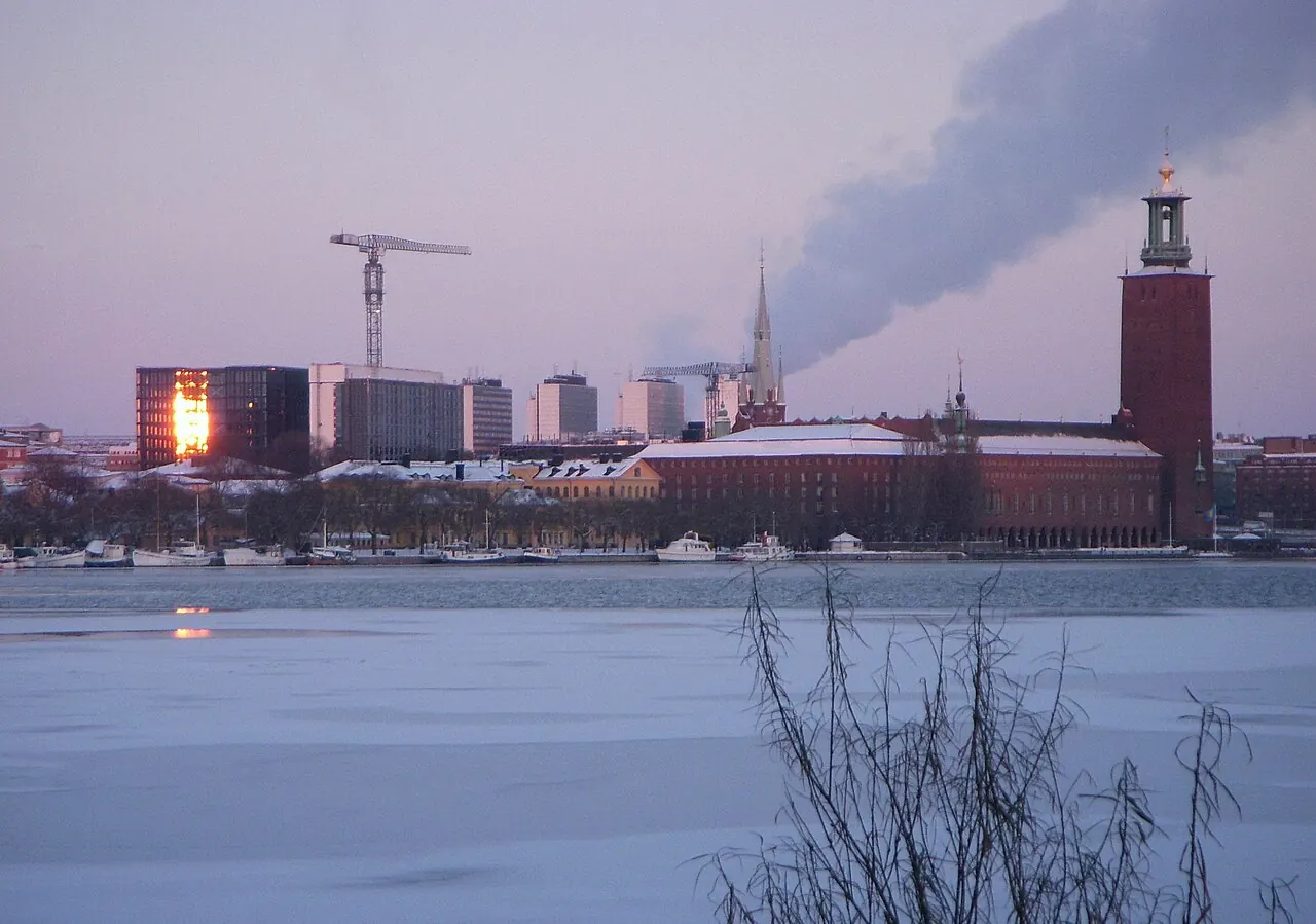 Stockholm City Hall and the neighbouring Waterfront buildings seen across the water