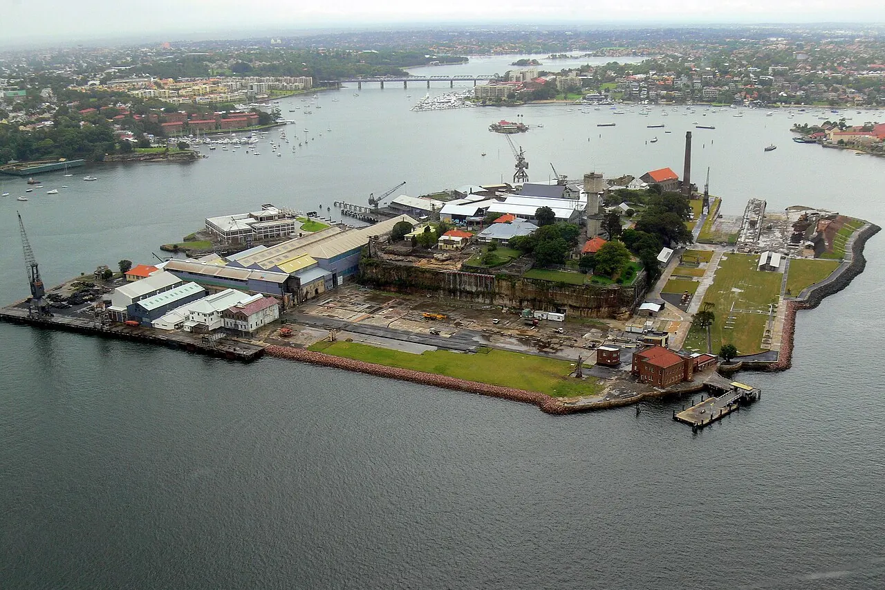 Cockatoo Island's former shipyard buildings and harbour surroundings