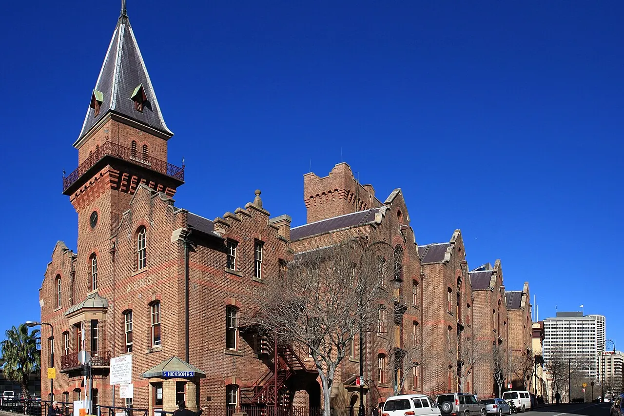 Historic brick buildings and a clock tower in The Rocks