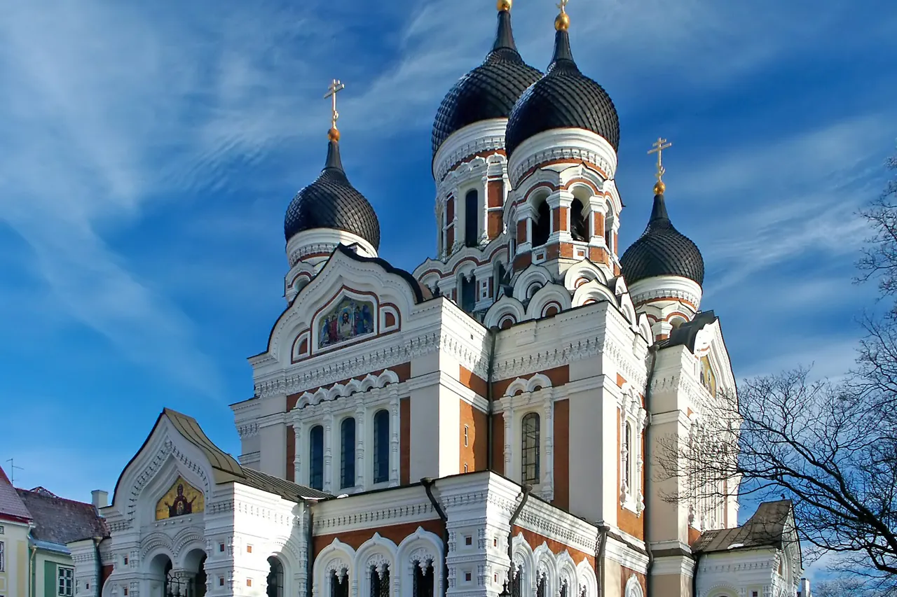 Onion domes and decorated facade of Alexander Nevsky Cathedral in Tallinn
