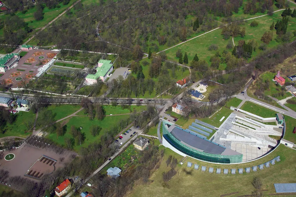Aerial view of Kumu's curved museum building beside Kadriorg Park in Tallinn