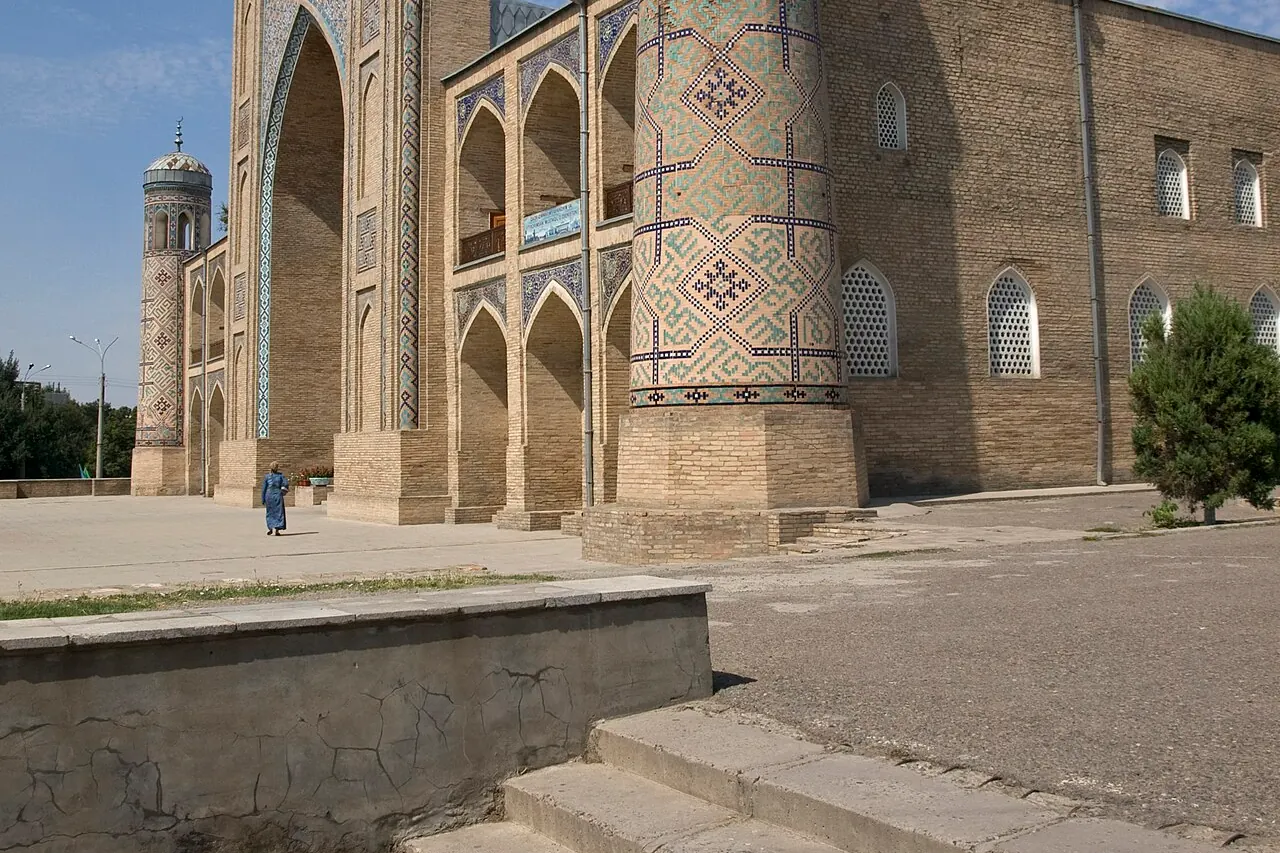 The brick entrance portal and adjoining walls of Kukeldash Madrasah