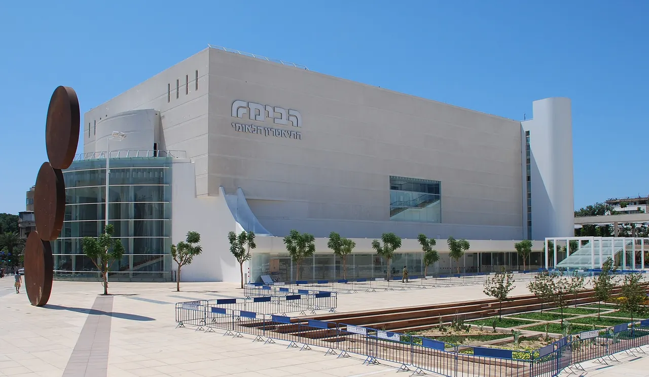 The white exterior and plaza of Habima Theatre in Tel Aviv