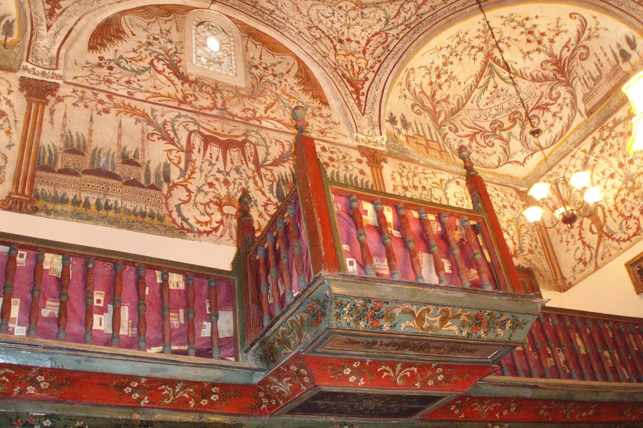 Painted walls, vaulted ceiling and wooden gallery inside Et'hem Bey Mosque in Tirana