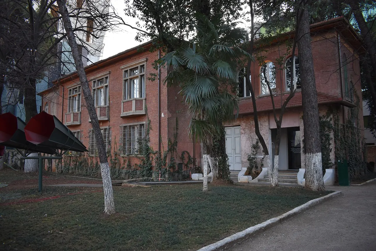 The villa and courtyard of the House of Leaves surveillance museum in Tirana