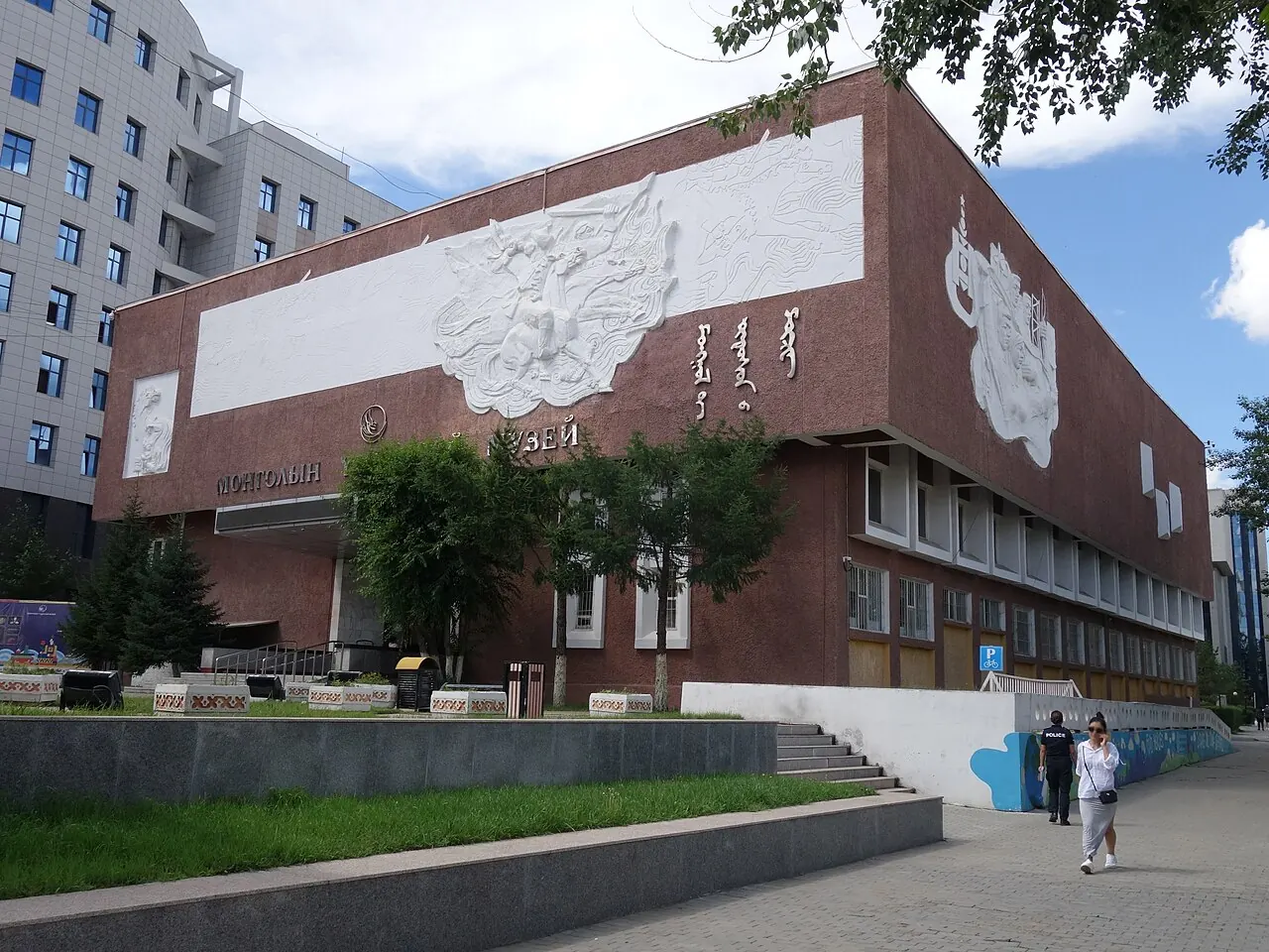 The red and pale facade of the National Museum of Mongolia in Ulaanbaatar