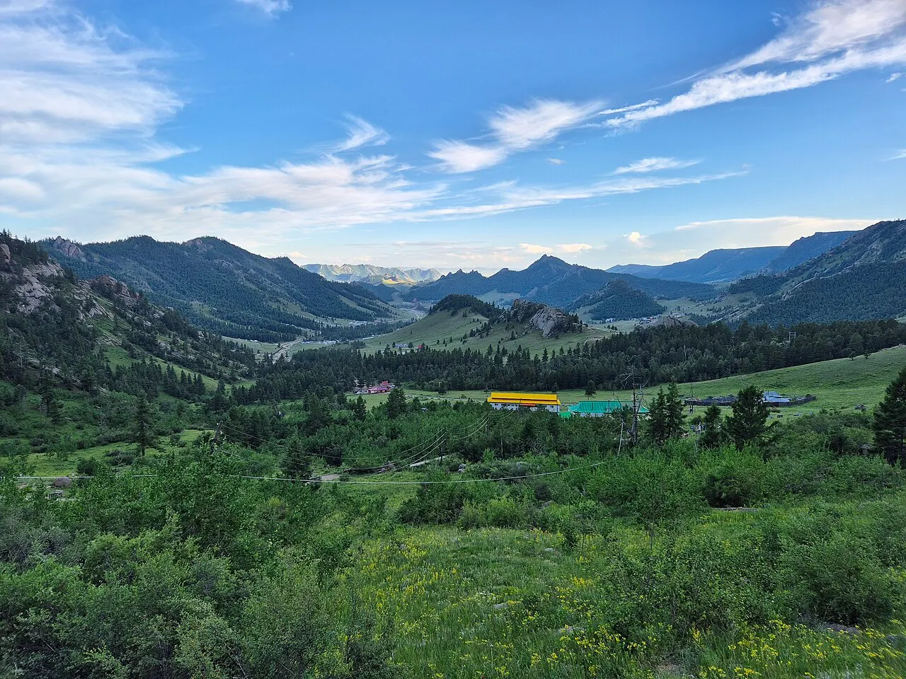 A green valley and rugged mountains in Gorkhi-Terelj National Park near Ulaanbaatar