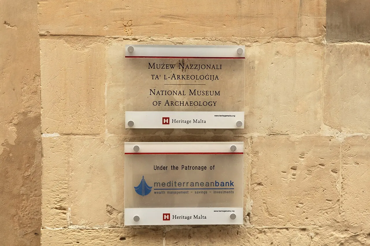 National Museum of Archaeology sign on the Auberge de Provence facade in Valletta