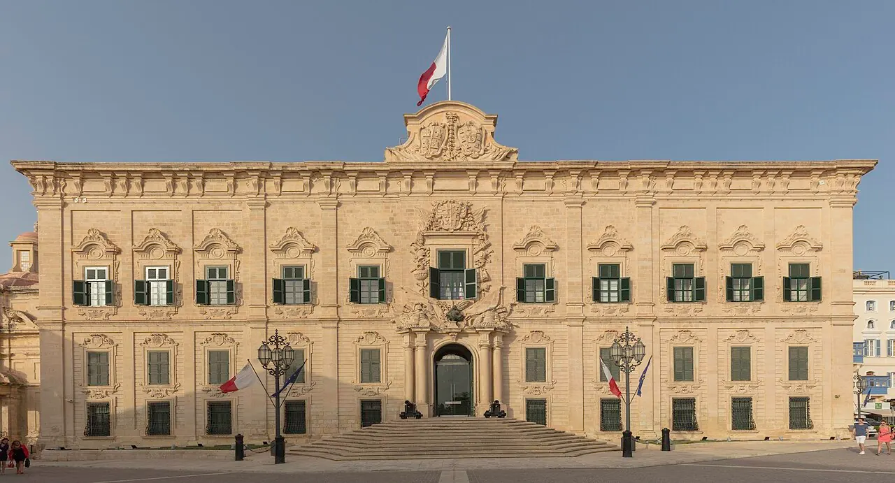 Ornate Auberge de Castille facade and broad stone entrance steps in Valletta