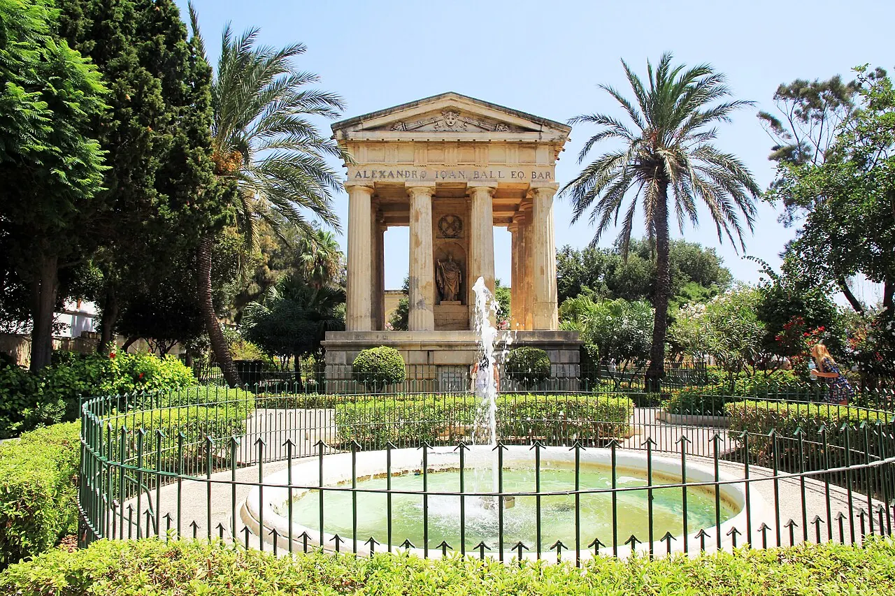 Neoclassical monument and palm trees in Lower Barrakka Gardens, Valletta