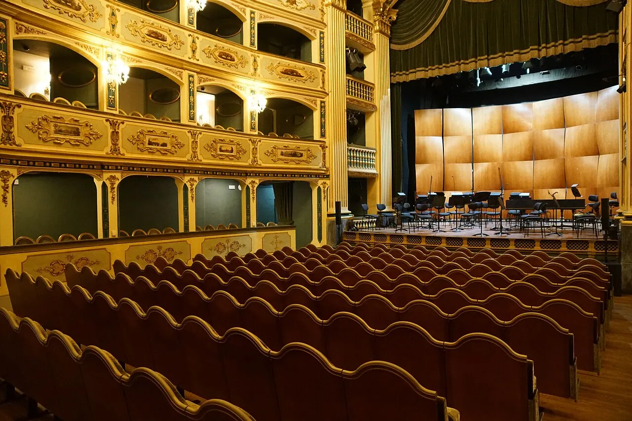 Manoel Theatre auditorium showing decorated boxes, seats and the stage in Valletta