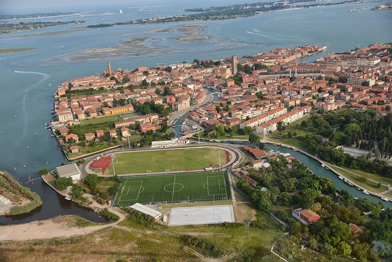 An aerial view of Murano's canals, bridges and tightly grouped buildings