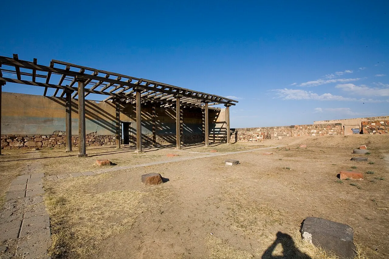 Excavated structures and protective roofs within Erebuni Fortress