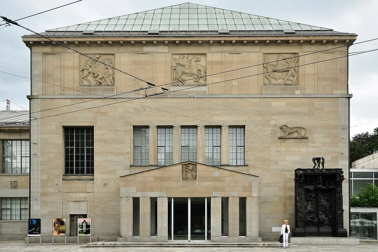 The historic Kunsthaus Zurich building and sculpture at Heimplatz