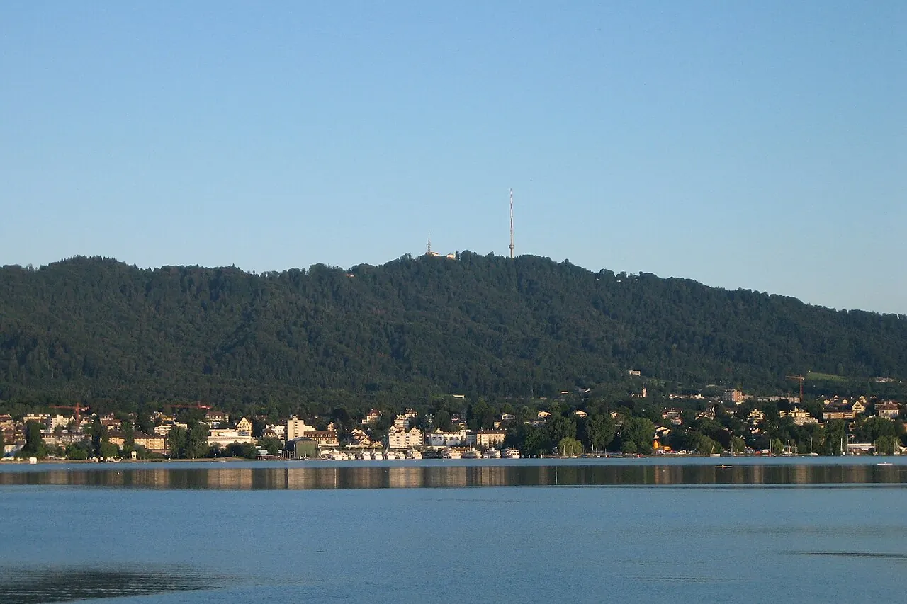 The wooded ridge of Uetliberg seen across the Zurich landscape